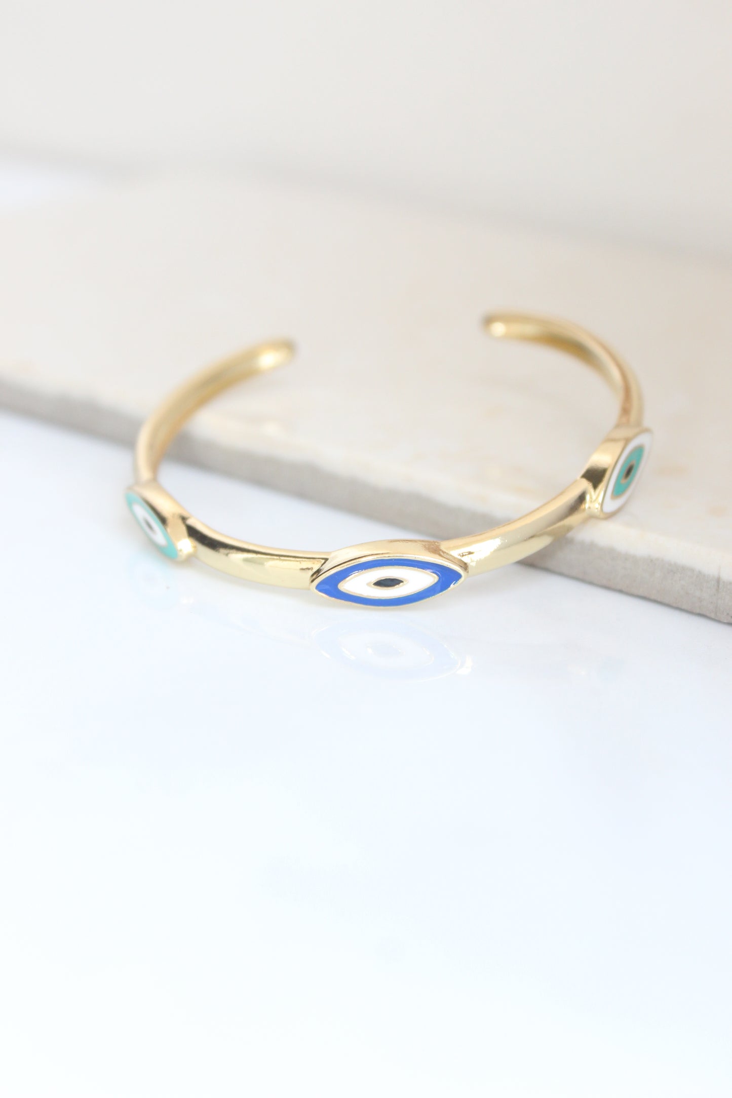 Stackable thin evil eye bangle