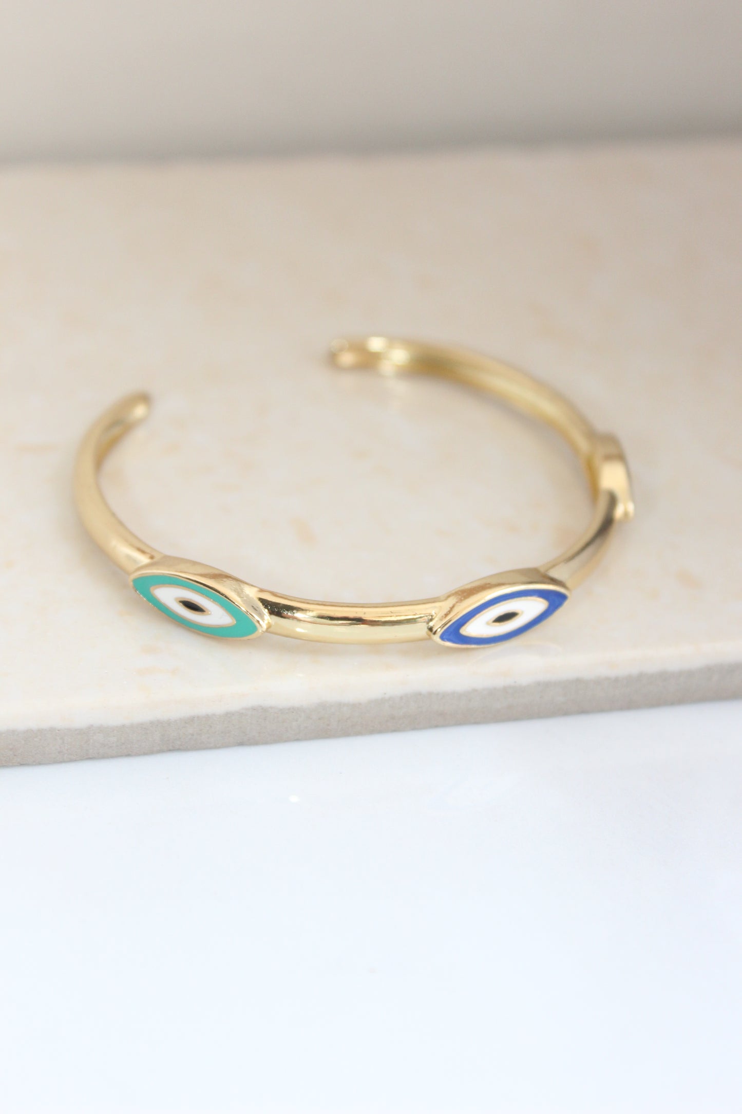 Stackable thin evil eye bangle