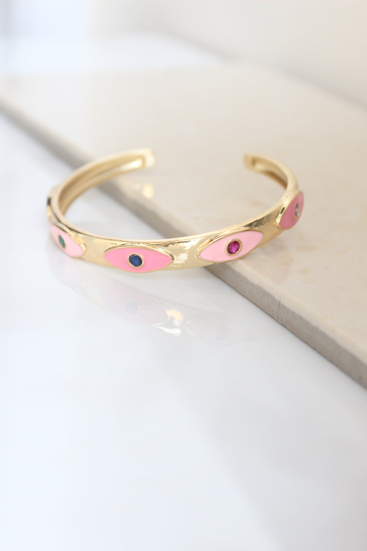 Stackable pink evil eye bangle